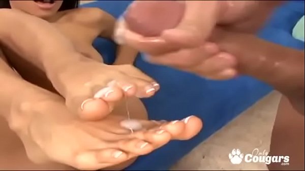 Casandra Cruz Gives A Footjob And Ends Up With Her Toes Covered In Cum