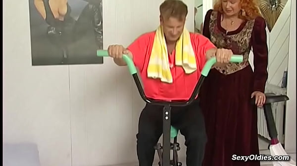 Redhead mature fucked by gym trainer