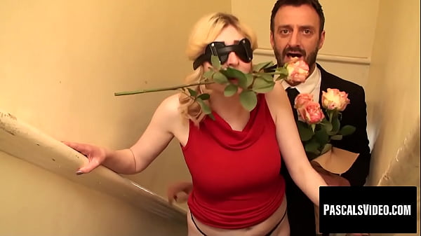 This blonde is really romantic with the rose in her mouth and kinky with a blindfold over her eyes.